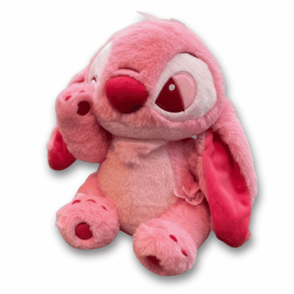 Peluche Stitch rosa, suave y abrazable, ideal para colección y abrazos, regalo perfecto para niños y fans de Disney.